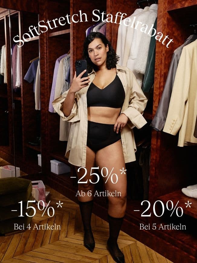 Woman in a black bra and underwear with a beige coat, taking a mirror selfie in a luxurious closet. Discount percentages are displayed.