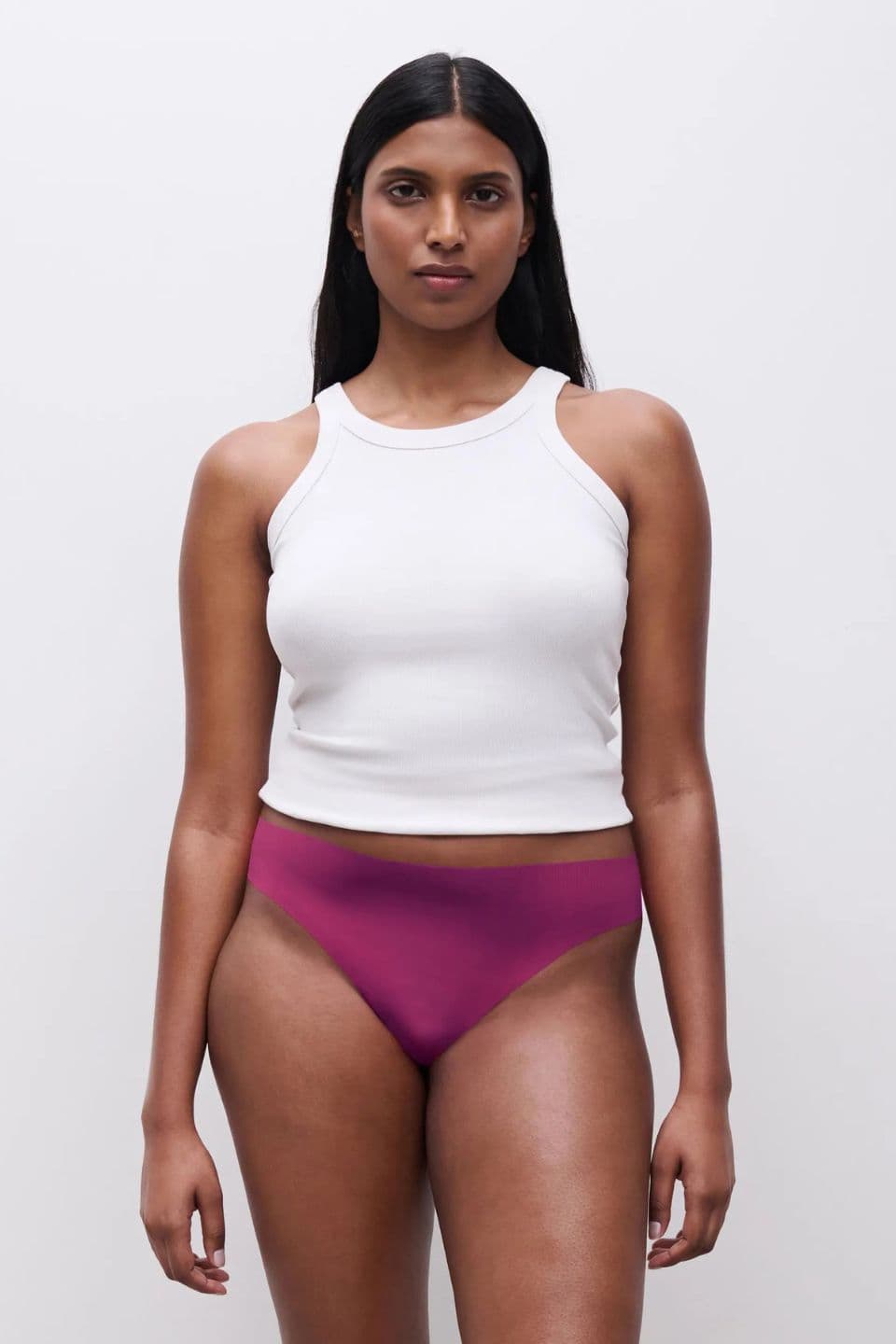 The image shows a woman wearing a grenadine seamless brief.