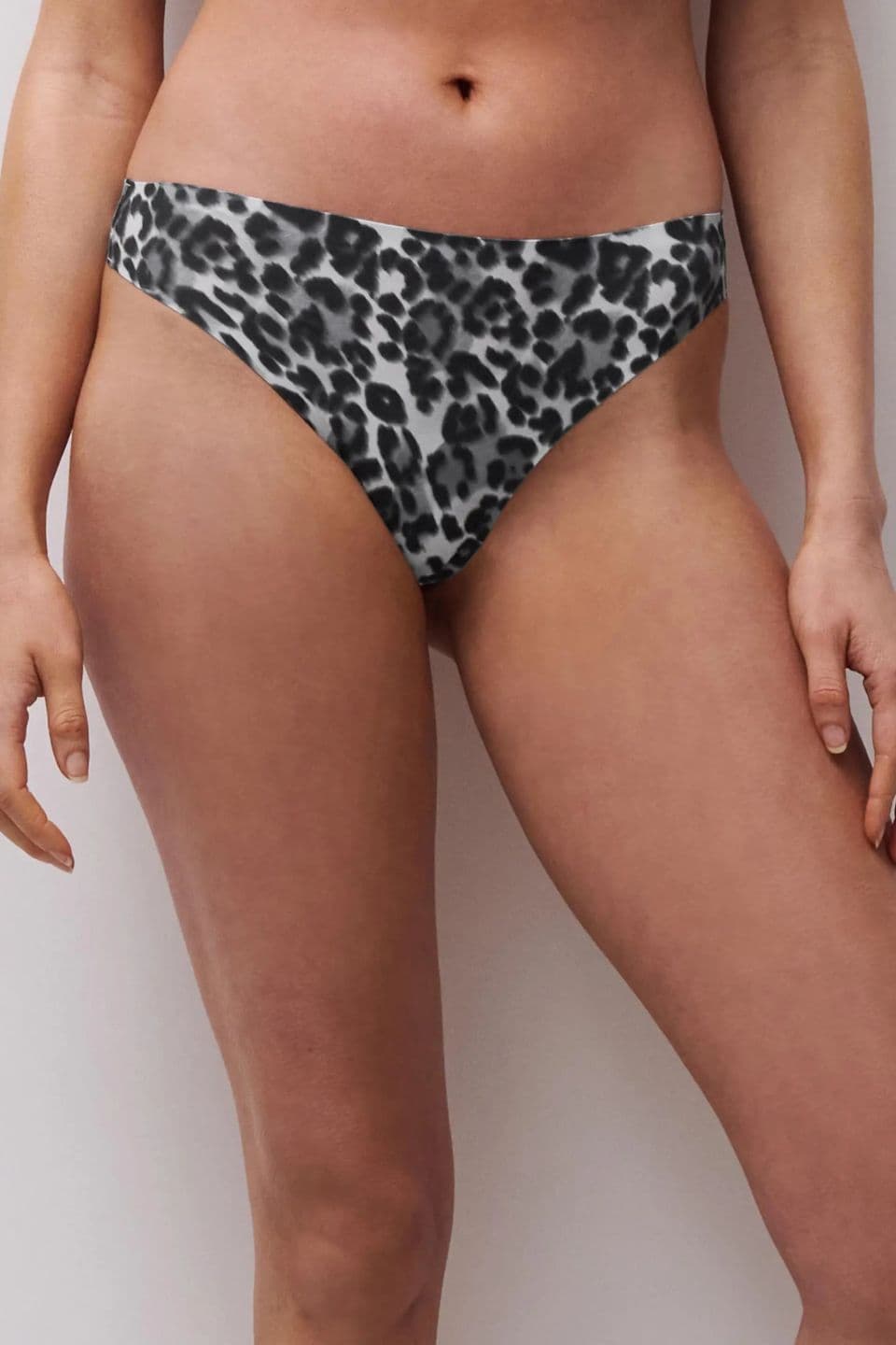 A sleek, seamless brief in a modern grey leopard print, designed for a smooth and invisible look under any outfit.
